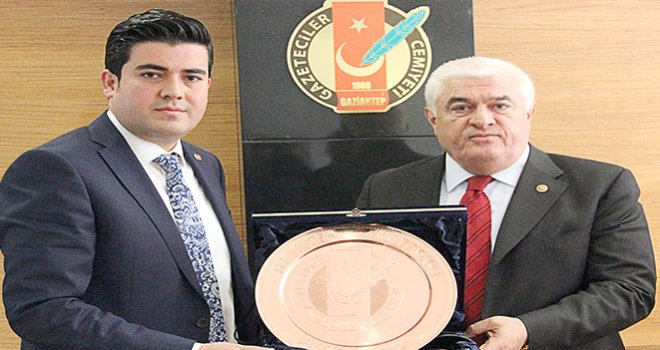 GGC’DEN AKİF EKİCİ’YE PLAKET
