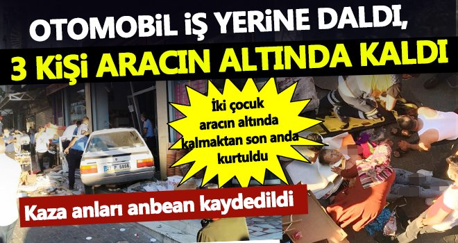  Otomobil iş yerine daldı, 3 kişi aracın altında kaldı