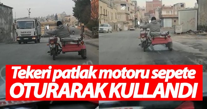  Tekeri patlak motoru sepete oturarak kullandı