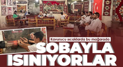 Kavurucu sıcaklarda bu mağarada sobayla ısınıyorlar