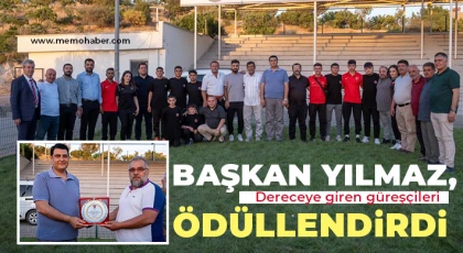 Yılmaz, dereceye giren güreşçileri ödüllendirdi