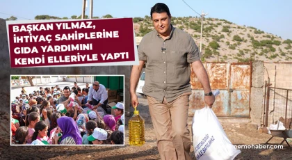 Yılmaz, ihtiyaç sahiplerine gıda yardımını kendi elleriyle yaptı