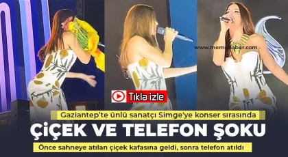 Önce sahneye atılan çiçek kafasına geldi, sonra telefon atıldı