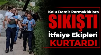 Kolu demir parmaklıklara sıkıştı İtfaiye ekipleri kurtardı