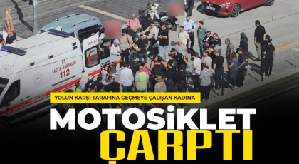 Yolun karşı tarafına geçmeye çalışan kadına motosiklet çarptı