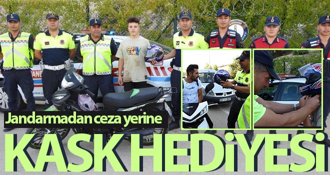 Jandarmanın kasksız sürücülere ceza yerine kask hediyesi şaşırttı 