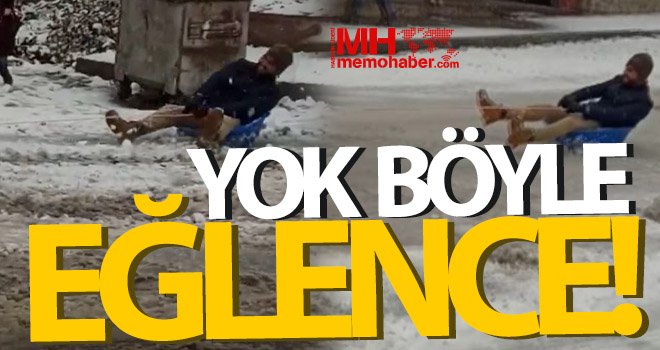 Kar üstünde leğenle snowboard yaptı