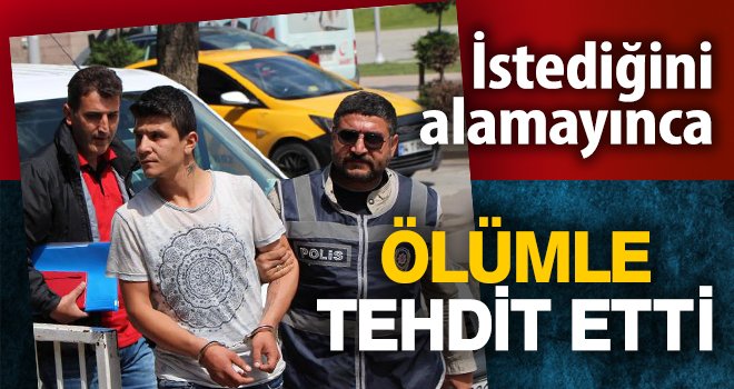 Marketten aldığı içkinin parasını ödemedi, kasiyeri ölümle tehdit etti