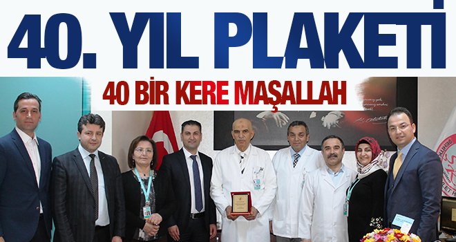 Meslekte 40. yılını dolduran Dr. Kınacı'ya onur plaketi verildi