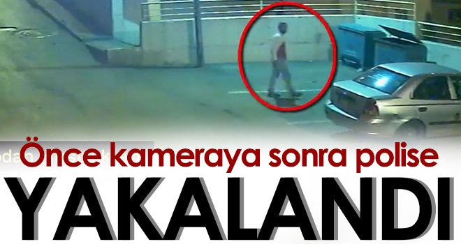 Otomobilden cep telefonu çalan şüpheli önce kameraya sonra polise yakalandı