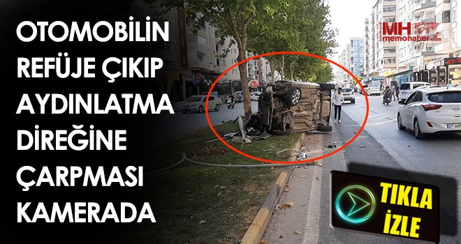 Otomobilin refüje çıkıp aydınlatma direğine çarpması kamerada