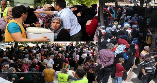 Suriyelilere gıda paketi dağıtımında izdiham