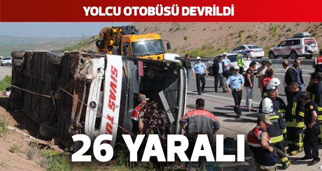 YOLCU OTOBÜSÜ DEVRİLDİ: 26 YARALI