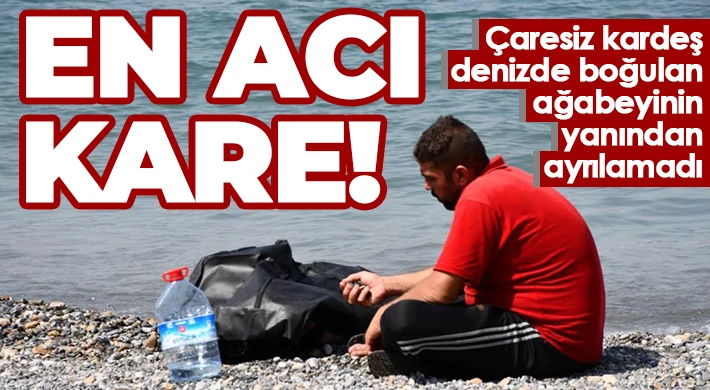 Çaresiz kardeş, denizde boğulan ağabeyinin yanından ayrılamadı